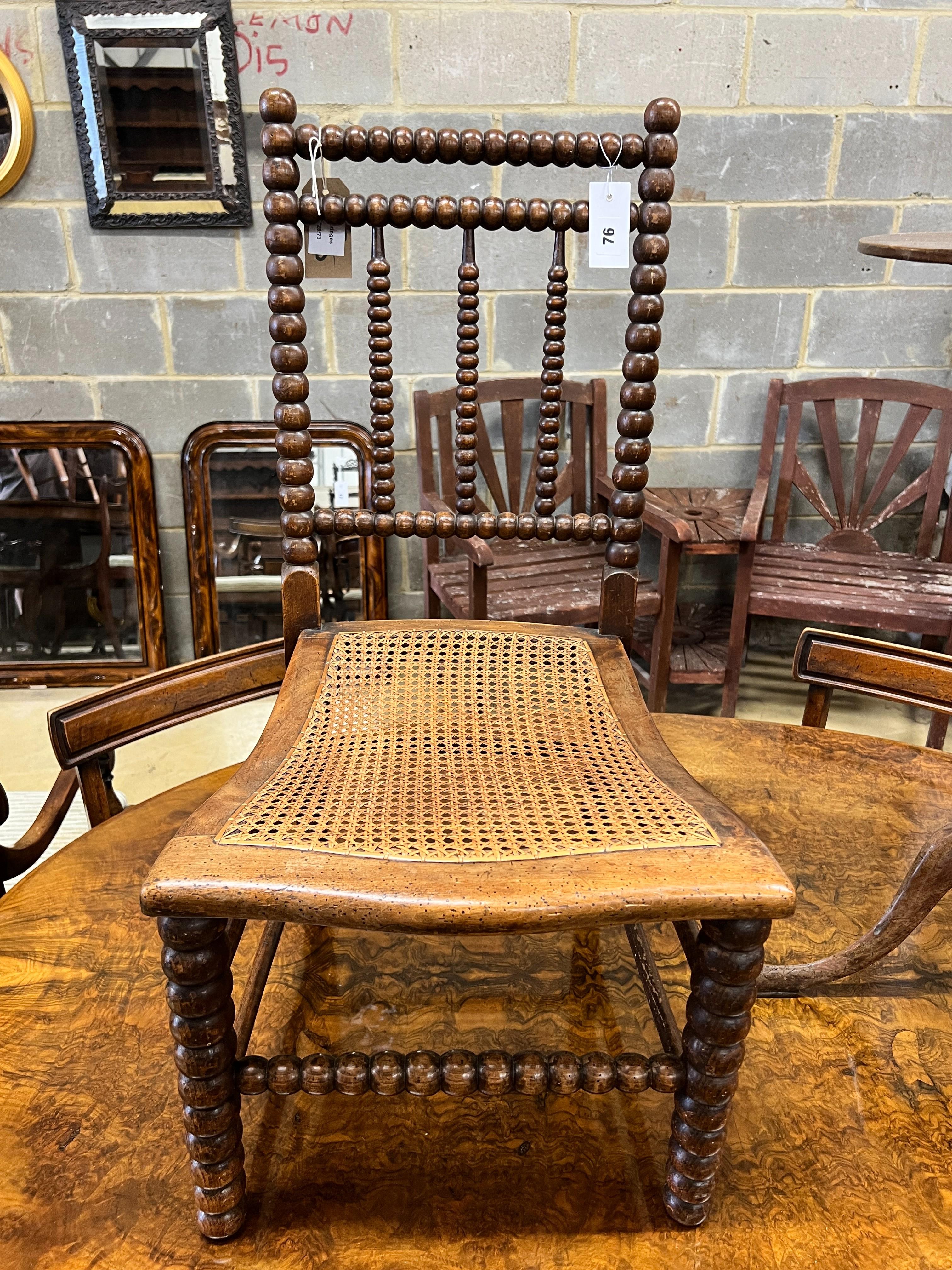 A Victorian bobbin turned rush seat chair